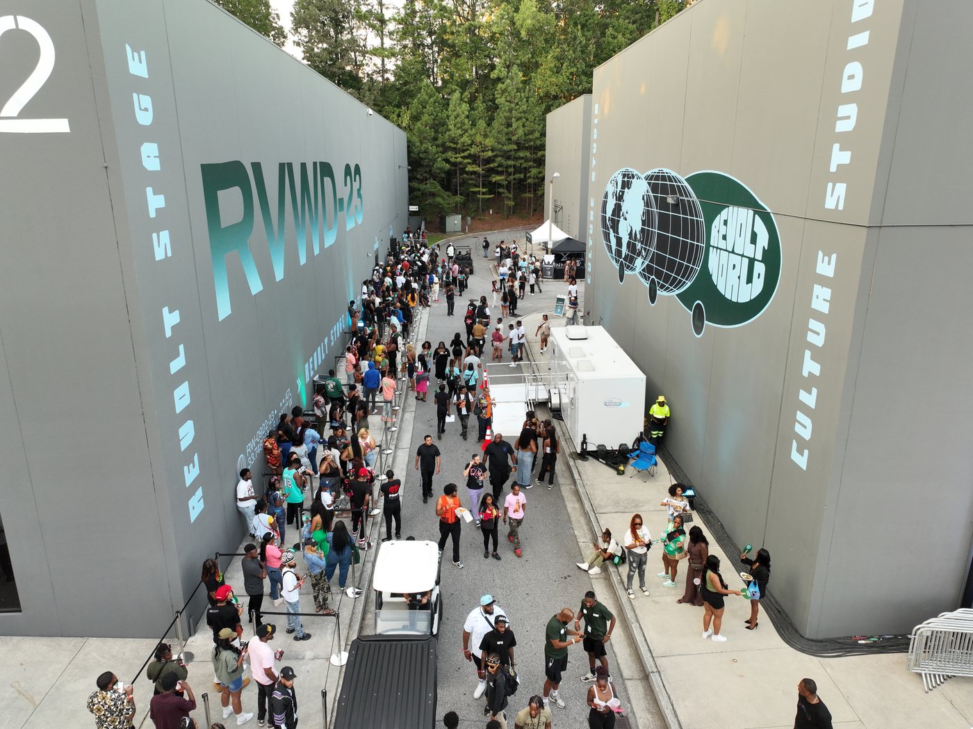 Aerial view of crowds between the REVOLT Stage and Culture Studio buildings at Revolt World