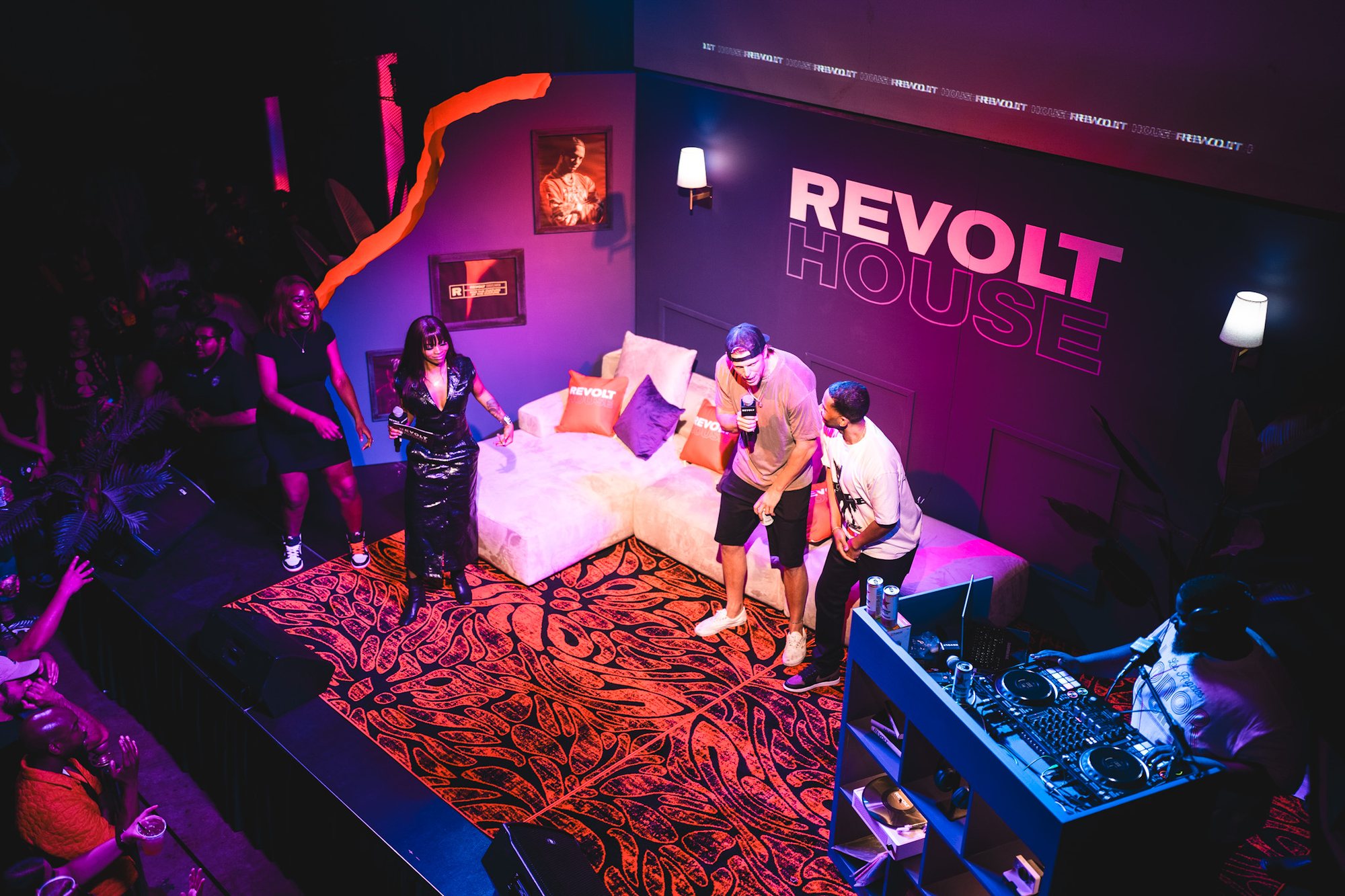 Live conversation on the REVOLT House stage at SXSW, with a DJ and crowd